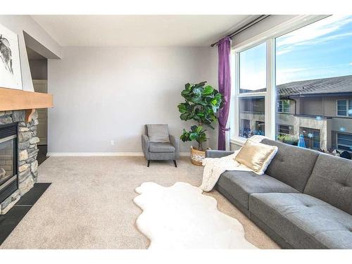 96 Aspen Hills Close Sw, Calgary, AB - Indoor Photo Showing Living Room With Fireplace