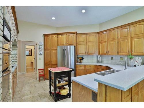 18 Varsity Estates Close Nw, Calgary, AB - Indoor Photo Showing Kitchen With Stainless Steel Kitchen With Double Sink