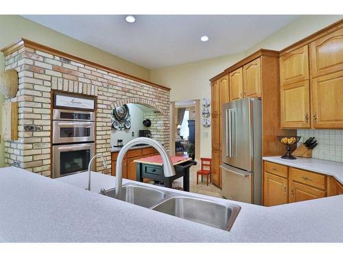 18 Varsity Estates Close Nw, Calgary, AB - Indoor Photo Showing Kitchen With Stainless Steel Kitchen With Double Sink