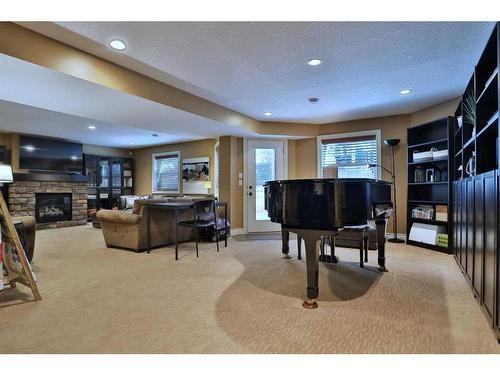 18 Varsity Estates Close Nw, Calgary, AB - Indoor Photo Showing Other Room With Fireplace