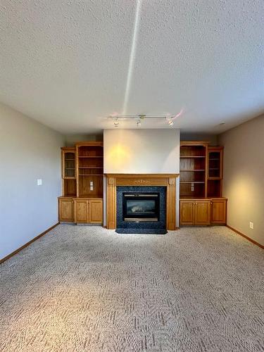 116 Darling Crescent, Red Deer, AB - Indoor With Fireplace