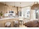 45 Shale Avenue, Cochrane, AB  - Indoor Photo Showing Kitchen With Upgraded Kitchen 