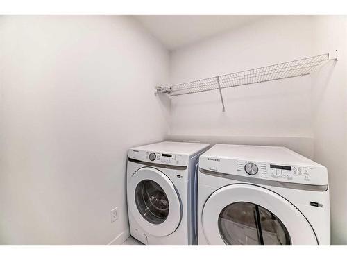 45 Shale Avenue, Cochrane, AB - Indoor Photo Showing Laundry Room