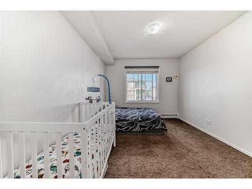 2320-215 Legacy Boulevard Se, Calgary, AB - Indoor Photo Showing Bedroom