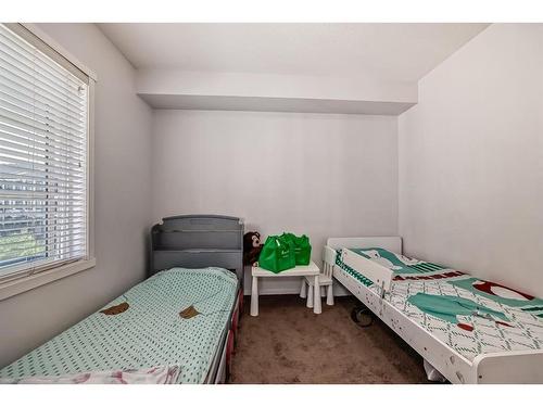 2320-215 Legacy Boulevard Se, Calgary, AB - Indoor Photo Showing Bedroom