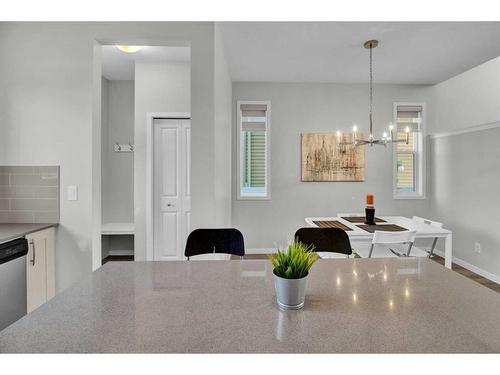 261 Creekside Boulevard Sw, Calgary, AB - Indoor Photo Showing Dining Room