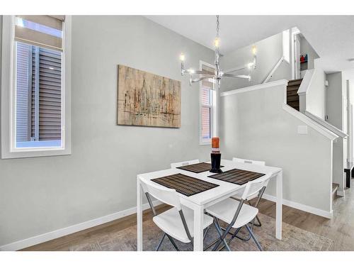 261 Creekside Boulevard Sw, Calgary, AB - Indoor Photo Showing Dining Room