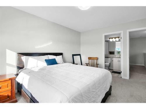 261 Creekside Boulevard Sw, Calgary, AB - Indoor Photo Showing Bedroom