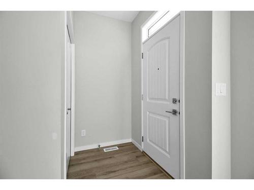 261 Creekside Boulevard Sw, Calgary, AB - Indoor Photo Showing Other Room