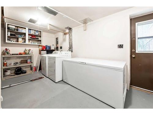 307 Woodvale Crescent Sw, Calgary, AB - Indoor Photo Showing Laundry Room