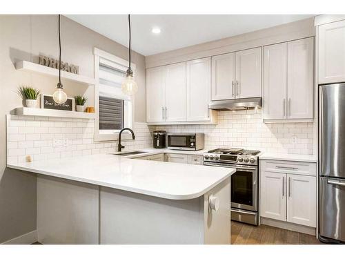 1404 29 Street Sw, Calgary, AB - Indoor Photo Showing Kitchen With Stainless Steel Kitchen With Upgraded Kitchen