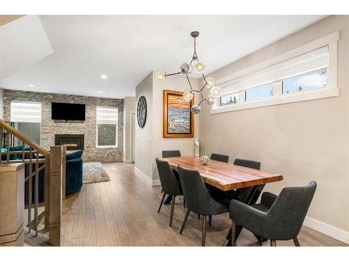 1404 29 Street Sw, Calgary, AB - Indoor Photo Showing Dining Room With Fireplace