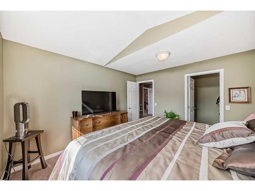 3-102 Canoe Square Sw, Airdrie, AB - Indoor Photo Showing Bedroom