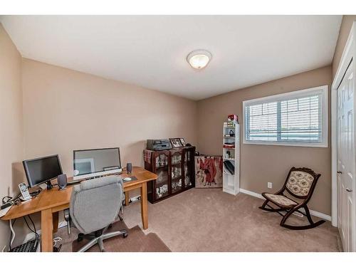 3-102 Canoe Square Sw, Airdrie, AB - Indoor Photo Showing Office