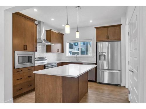 301 Bayview Street Sw, Airdrie, AB - Indoor Photo Showing Kitchen With Stainless Steel Kitchen With Upgraded Kitchen