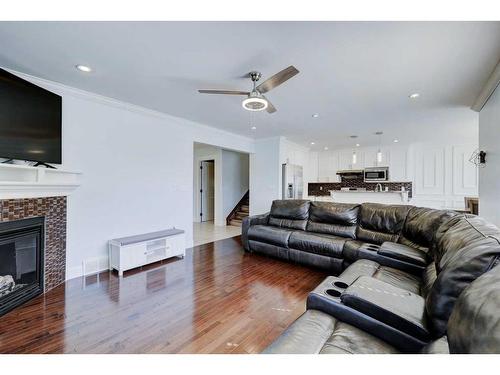 1699 Baywater Park, Airdrie, AB - Indoor Photo Showing Living Room With Fireplace