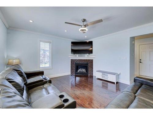 1699 Baywater Park, Airdrie, AB - Indoor Photo Showing Living Room With Fireplace