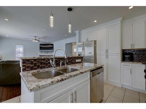 1699 Baywater Park, Airdrie, AB - Indoor Photo Showing Kitchen With Double Sink With Upgraded Kitchen