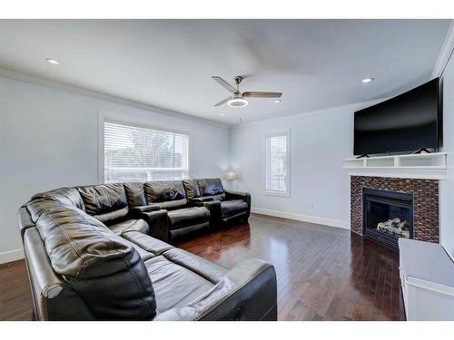 1699 Baywater Park, Airdrie, AB - Indoor Photo Showing Living Room With Fireplace