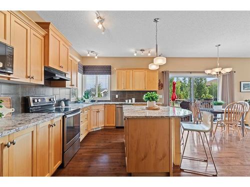 2002 High Country Rise Nw, High River, AB - Indoor Photo Showing Kitchen With Double Sink