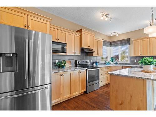 2002 High Country Rise Nw, High River, AB - Indoor Photo Showing Kitchen With Double Sink