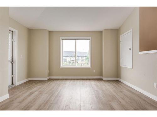 4202-2781 Chinook Winds Drive Sw, Airdrie, AB - Indoor Photo Showing Other Room