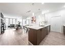 301-28 Auburn Bay Link Se, Calgary, AB  - Indoor Photo Showing Kitchen With Upgraded Kitchen 