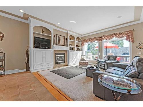 31 Canso Green Sw, Calgary, AB - Indoor Photo Showing Living Room With Fireplace