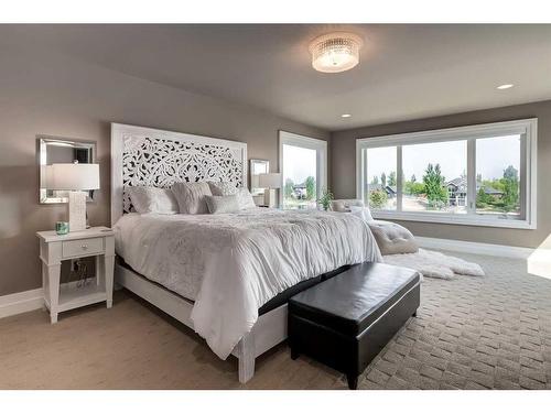 68 Heritage Lake Shores, Heritage Pointe, AB - Indoor Photo Showing Bedroom