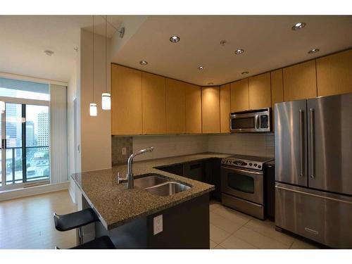 1206-788 12 Avenue Sw, Calgary, AB - Indoor Photo Showing Kitchen With Stainless Steel Kitchen With Double Sink