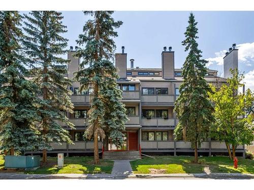 306-414 Squirrel Street, Banff, AB - Outdoor With Facade