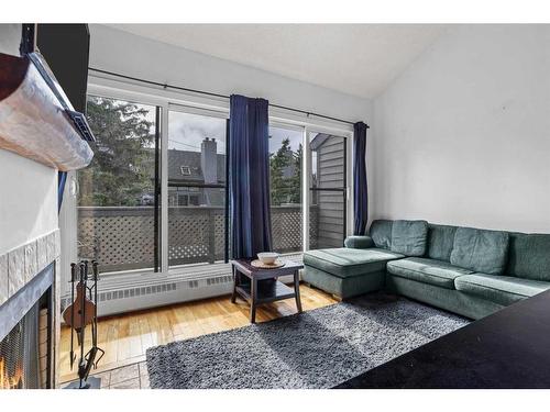 306-414 Squirrel Street, Banff, AB - Indoor Photo Showing Living Room