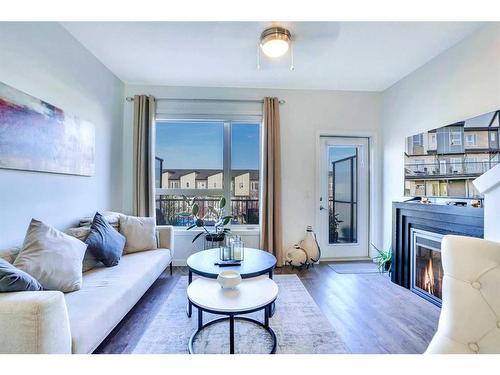 263 Redstone Boulevard Ne, Calgary, AB - Indoor Photo Showing Living Room With Fireplace