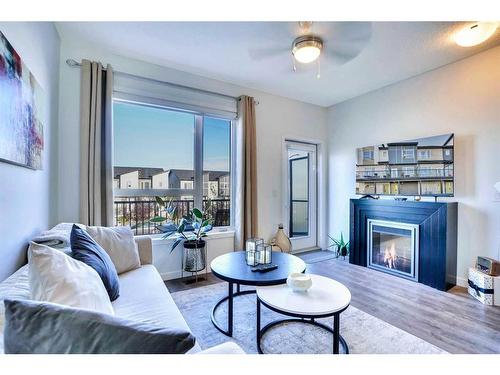 263 Redstone Boulevard Ne, Calgary, AB - Indoor Photo Showing Living Room With Fireplace