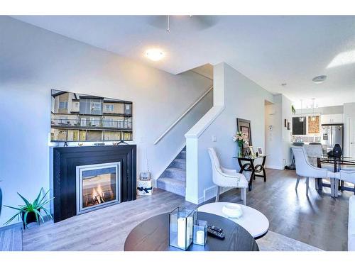 263 Redstone Boulevard Ne, Calgary, AB - Indoor Photo Showing Living Room With Fireplace