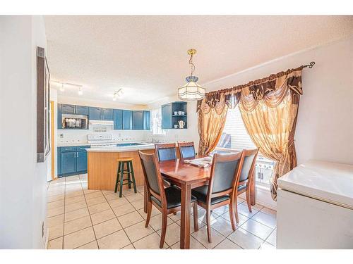 127 Erin Meadow Way Se, Calgary, AB - Indoor Photo Showing Dining Room