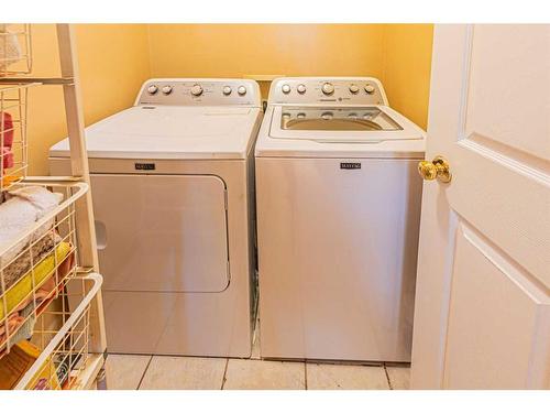 127 Erin Meadow Way Se, Calgary, AB - Indoor Photo Showing Laundry Room