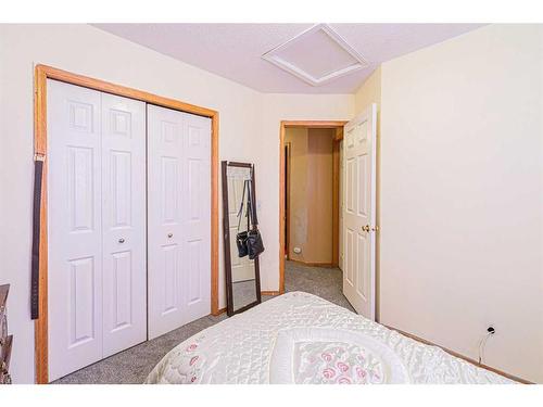 127 Erin Meadow Way Se, Calgary, AB - Indoor Photo Showing Bedroom