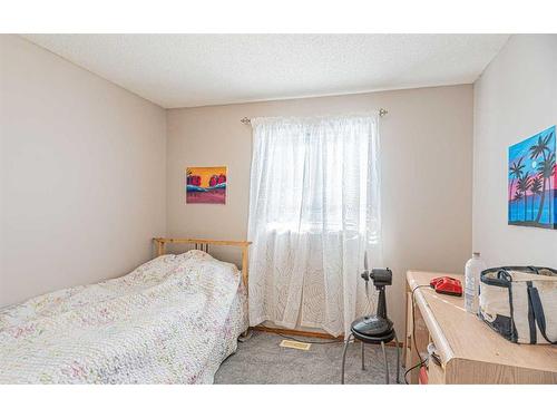 127 Erin Meadow Way Se, Calgary, AB - Indoor Photo Showing Bedroom