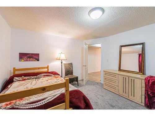 127 Erin Meadow Way Se, Calgary, AB - Indoor Photo Showing Bedroom