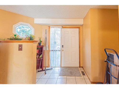 127 Erin Meadow Way Se, Calgary, AB - Indoor Photo Showing Other Room