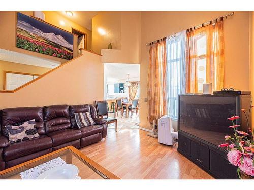 127 Erin Meadow Way Se, Calgary, AB - Indoor Photo Showing Living Room