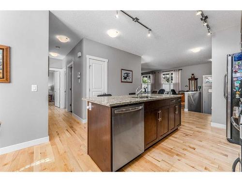 948 Mckenzie Towne Manor Se, Calgary, AB - Indoor Photo Showing Kitchen With Double Sink