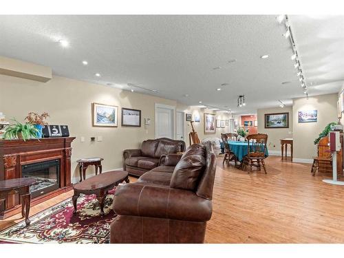 4 Highland Ranch Estates, Rural Foothills County, AB - Indoor Photo Showing Living Room With Fireplace