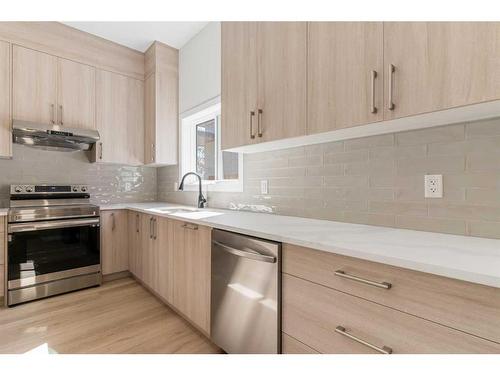 8315 Centre Street Nw, Calgary, AB - Indoor Photo Showing Kitchen With Stainless Steel Kitchen With Upgraded Kitchen