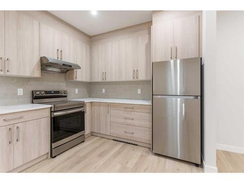 8315 Centre Street Nw, Calgary, AB - Indoor Photo Showing Kitchen With Stainless Steel Kitchen