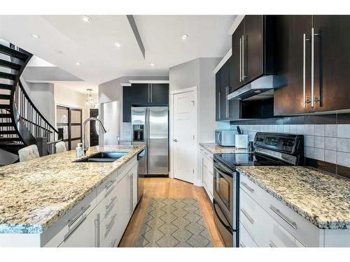 2412 26 Street Sw, Calgary, AB - Indoor Photo Showing Kitchen With Stainless Steel Kitchen With Double Sink With Upgraded Kitchen