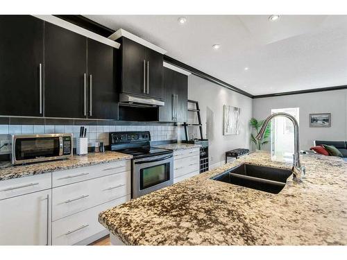 2412 26 Street Sw, Calgary, AB - Indoor Photo Showing Kitchen With Double Sink