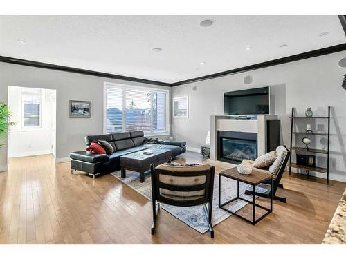 2412 26 Street Sw, Calgary, AB - Indoor Photo Showing Living Room With Fireplace