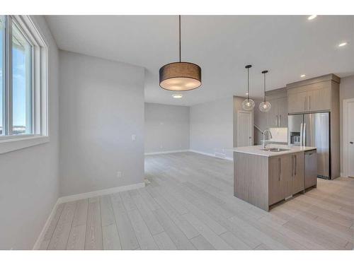 219 Dawson Wharf Rise, Chestermere, AB - Indoor Photo Showing Kitchen